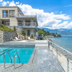 https://villa-casa-del-sasso-fronte-lago-como.it-lombardy.com